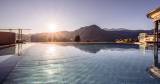 The stunning view from the infinity pool at the Sporthotel Alpina in Austria.