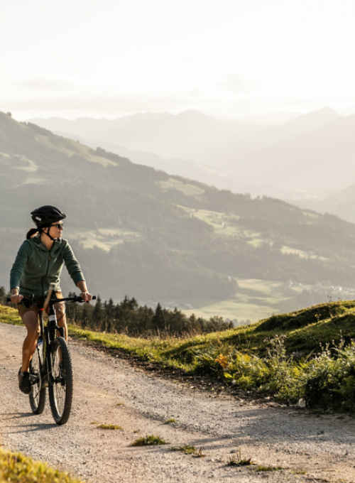 A couple explores the Salzburg mountain region on e-bikes.